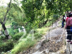 encuentran cuerpo en el rio (1)