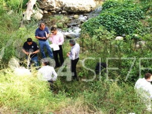 encuentran cuerpo en el rio (2)