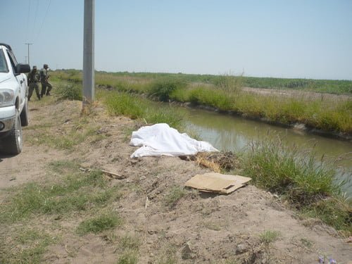 Encuentran cadáver en canal de riego en Matamoros