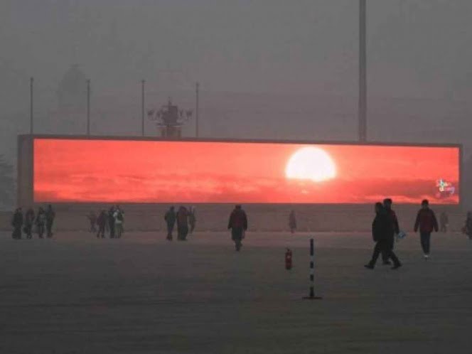 China emite el amanecer en pantallas en medio de la contaminación