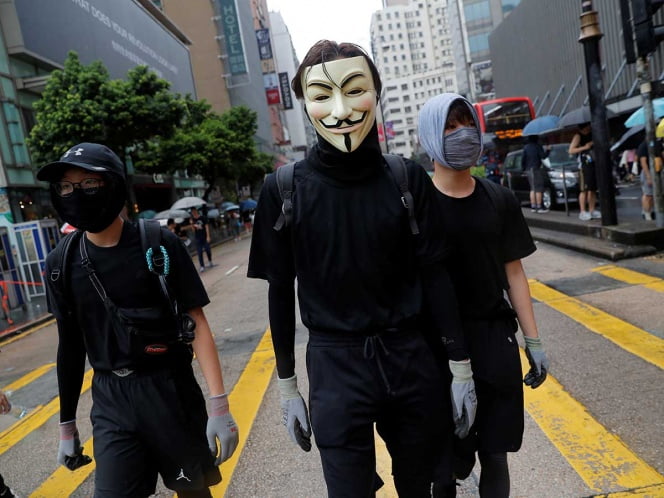 Procesan a 2 en Hong Kong por usar máscaras