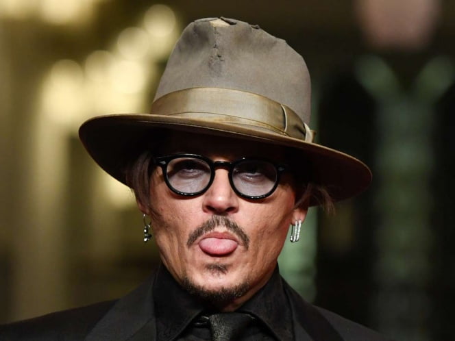 Johnny Depp demanda a periódico por acusarlo de golpear a su ex