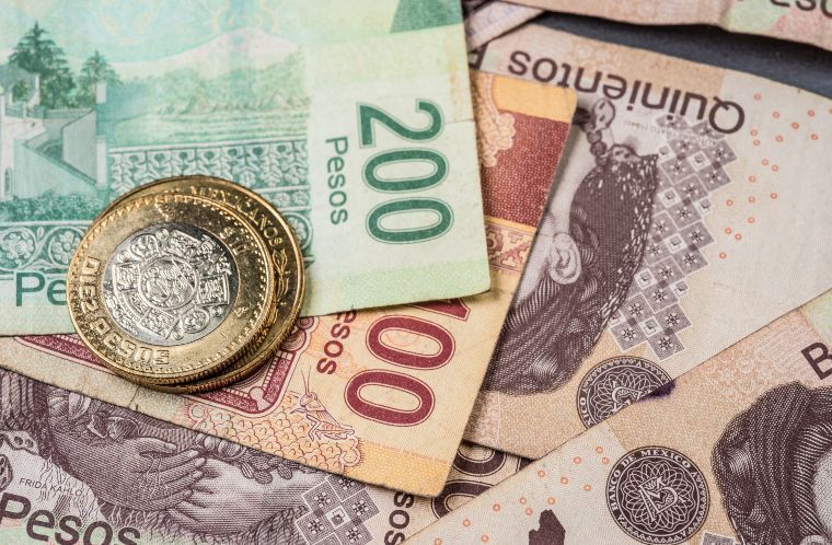 Avance de vacuna contra Covid-19 impulsa al peso