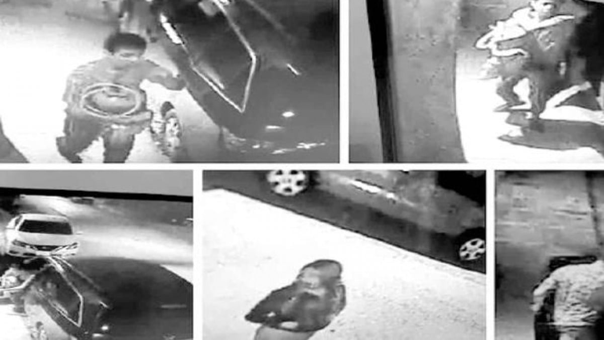Cámara de vigilancia capta a pareja robando las pertenencias de un automóvil  