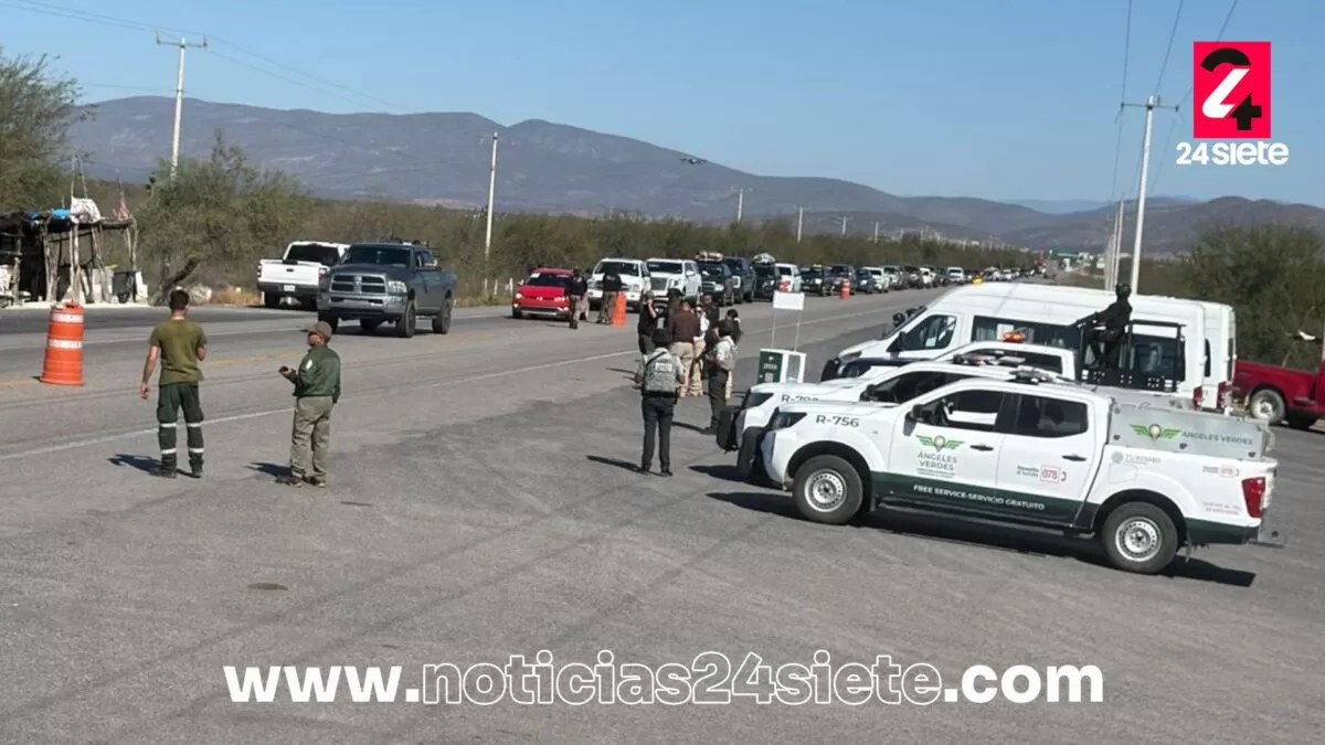 Escolta Guardia Estatal caravana de 250 paisanos en la Carretera Federal 101